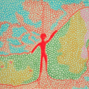 坐在白色的大樹下面